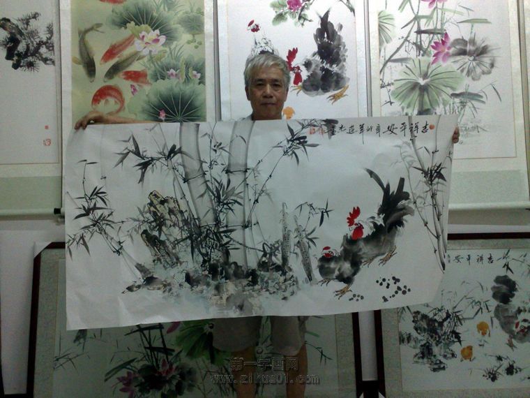 老畫家覃連杰老師現場展示本作品